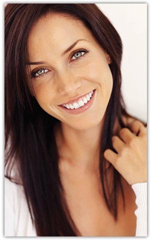 woman with dark hair smiling